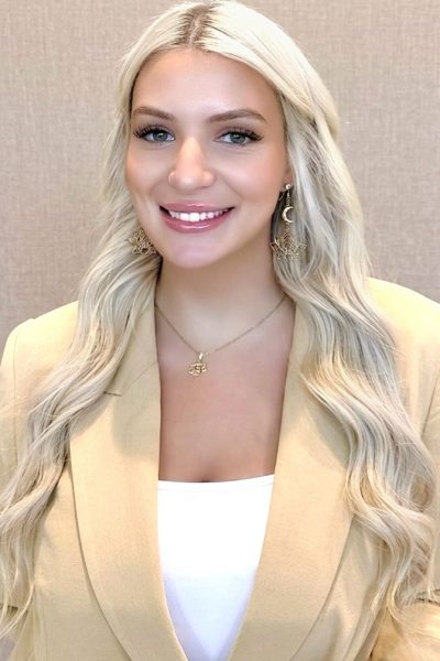 Elizabeth Sisto, therapist at Kind Mind Psychology, smiling in a professional headshot